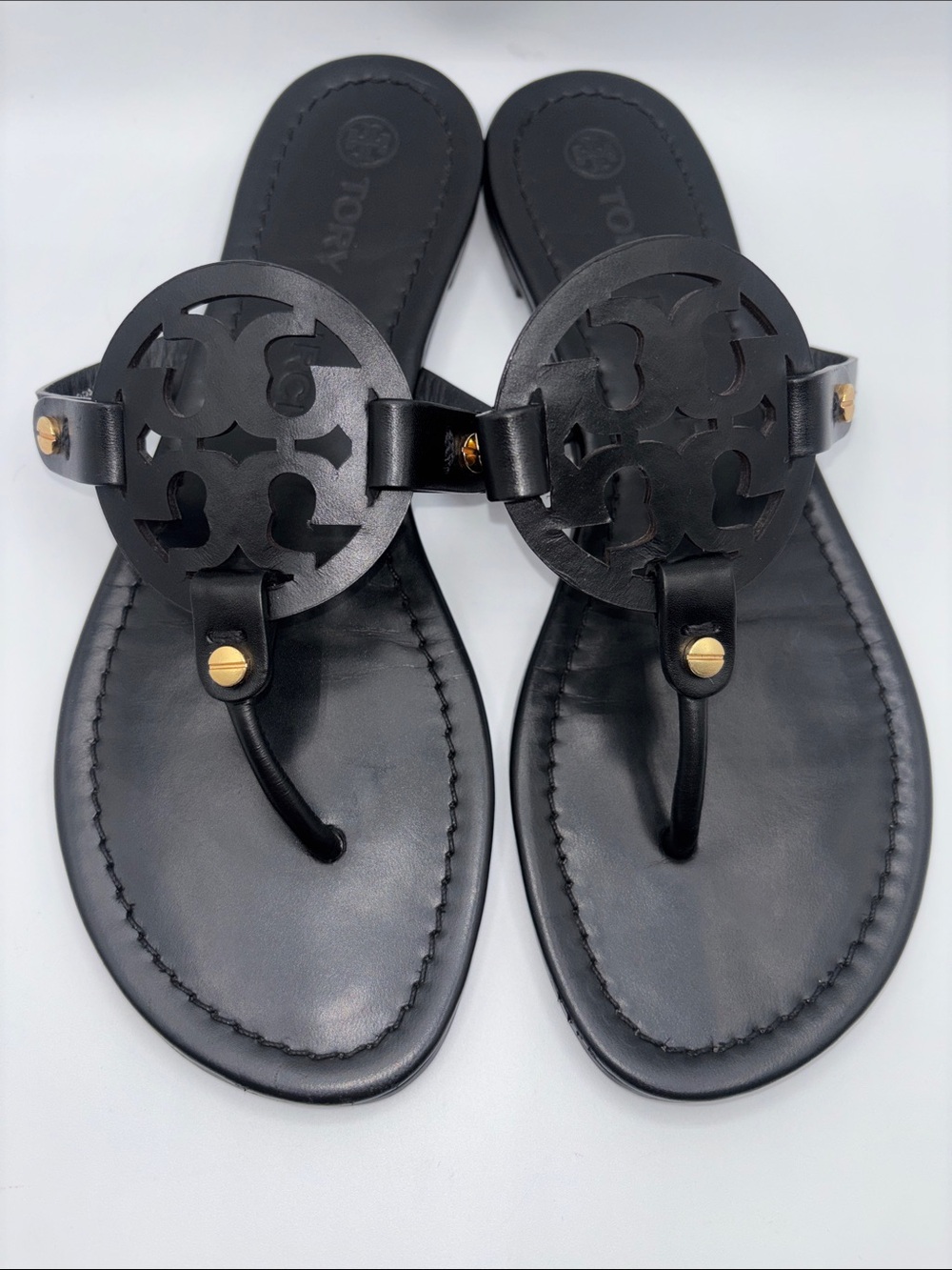 Tory Burch Miller Black Leather Cutout Logo Thong Sandals with Gold Studs